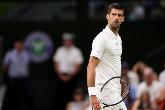 7th July 2023; All England Lawn Tennis and Croquet Club, London, England: Wimbledon Tennis Tournament; Novak Djokovic looks up into the crowd after he breaks the serve of Stan Wawrinka  ActionPlus12528294 ShaunxBrooks