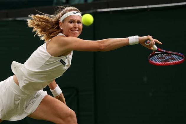 7th July 2023; All England Lawn Tennis and Croquet Club, London, England: Wimbledon Tennis Tournament; Marie Bouzkova reaches as she returns the serve from Caroline Garcia  ActionPlus12528317 ShaunxBrooks