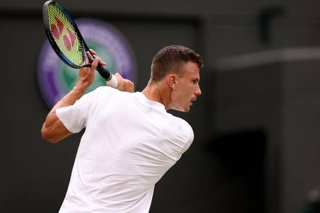 8th July 2023; All England Lawn Tennis and Croquet Club, London, England: Wimbledon Tennis Tournament; Marton Fucsovics plays a forehand shot to Daniil Medvedev  ActionPlus12528639 ShaunxBrooks