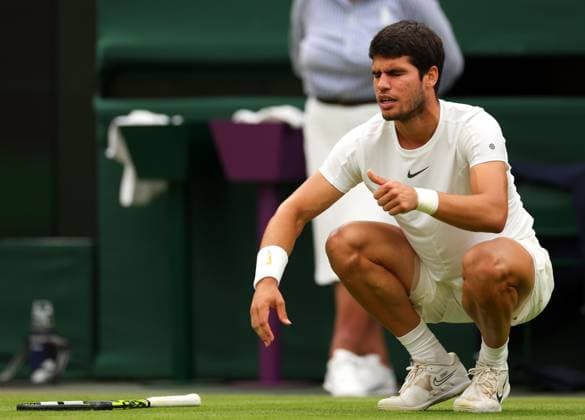 Mandatory Credit: Photo by Ella Ling Shutterstock (14001529ad) Carlos Alcaraz slips during his third round match Wimbledon Tennis Championships, Day 6, The All England Lawn Tennis and Croquet Club, London, UK - 08 Jul 2023 Wimbledon Tennis Championships, Day 6, The All England Lawn Tennis and Croquet Club, London, UK - 08 Jul 2023  Copyright: xEllaxLing Shutterstockx 14001529ad