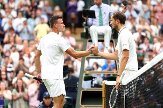 Mandatory Credit: Photo by Simon Dael Shutterstock (14001530co) Daniil Medvedev celebrates winning his third round match against Marton Fucsovics Wimbledon Tennis Championships, Day 6, The All England Lawn Tennis and Croquet Club, London, UK - 08 Jul 2023 Wimbledon Tennis Championships, Day 6, The All England Lawn Tennis and Croquet Club, London, UK - 08 Jul 2023  Copyright: xSimonxDael Shutterstockx 14001530co