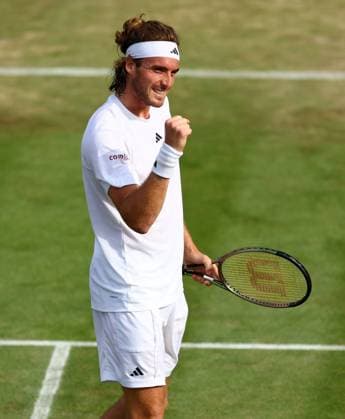 Mandatory Credit: Photo by Simon Dael Shutterstock (14001530dl) Stefanos Tsitsipas celebrates after winning his third round match Wimbledon Tennis Championships, Day 6, The All England Lawn Tennis and Croquet Club, London, UK - 08 Jul 2023 Wimbledon Tennis Championships, Day 6, The All England Lawn Tennis and Croquet Club, London, UK - 08 Jul 2023  Copyright: xSimonxDael Shutterstockx 14001530dl