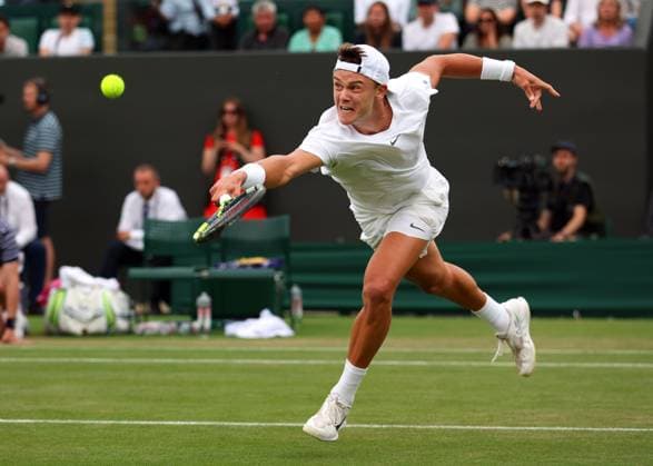 Mandatory Credit: Photo by Ella Ling Shutterstock (14001529bg) Holger Rune during his third round match Wimbledon Tennis Championships, Day 6, The All England Lawn Tennis and Croquet Club, London, UK - 08 Jul 2023 Wimbledon Tennis Championships, Day 6, The All England Lawn Tennis and Croquet Club, London, UK - 08 Jul 2023  Copyright: xEllaxLing Shutterstockx 14001529bg