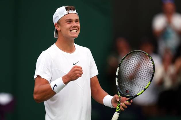Mandatory Credit: Photo by Ella Ling Shutterstock (14001529bw) Holger Rune celebrates victory in his third round match Wimbledon Tennis Championships, Day 6, The All England Lawn Tennis and Croquet Club, London, UK - 08 Jul 2023 Wimbledon Tennis Championships, Day 6, The All England Lawn Tennis and Croquet Club, London, UK - 08 Jul 2023  Copyright: xEllaxLing Shutterstockx 14001529bw
