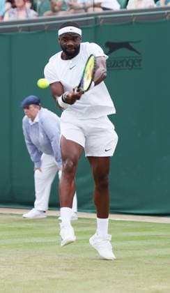 Bulgarian Gregor Dimitrov plays a backhand in his match against American Frances Tiafoe on day six of the 2023 Wimbledon championships in London on Saturday, July 08, 2023.  LON2023070862 HUGOxPHILPOTT