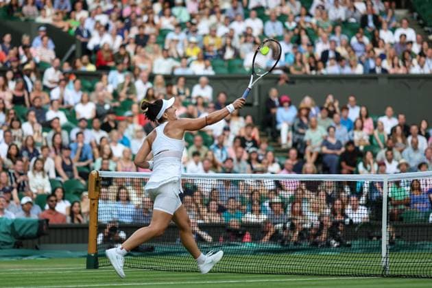 Wimbledon: Day Six 8 July 2023, Wimbledon - Wimbledon Tennis Championships - Day Six - Bianca Andreescu (CAN) wins a point at the net against Ons Jabeur (TUN) - Photo: Charlotte Wilson Offside. Wimbledon UK Copyright: xCharlottexWilsonx xOffsidexOffside