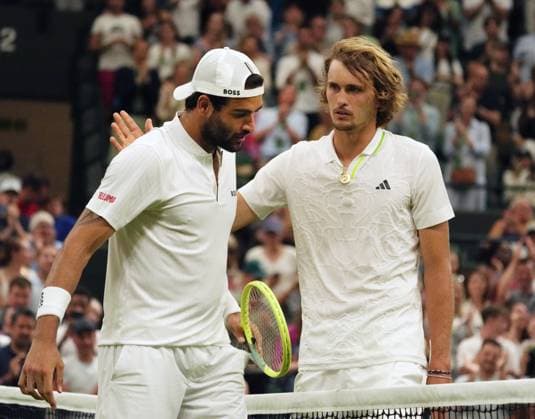 Tennis - 2023 Wimbledon Championships - Week One - Day Six - All England lawn Tennis & Racquet Club, Wimbledon - Saturday 8th Mens Singles - Alexander Zverev (GER) v Matteo Berrettini (ITA) Matteo Berrettini at the net after the match with Alexander Zverev 