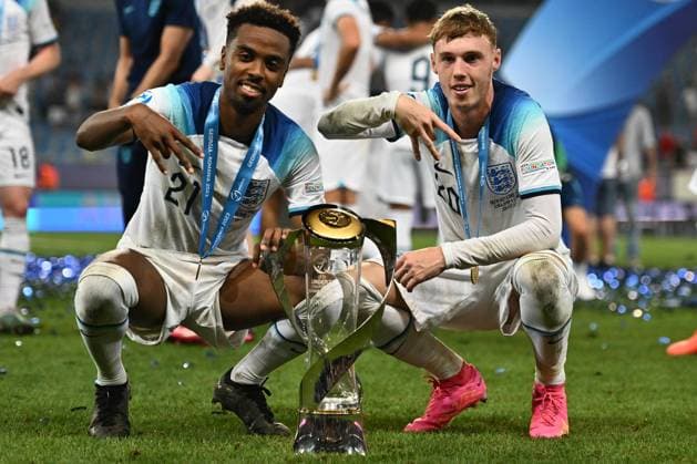 BATUMI, GEORGIA - JULY 8: England s players Angel Gomes, Cole Palmer celebrate with the trophy after winning the UEFA European Under-21 Championship final match between England and Spain on July 8, 2023 on Adjarabet Arena in Batumi, G England v Spain - UEFA Under-21 Euro 2023 Final Copyright: xSebastianxFrejx