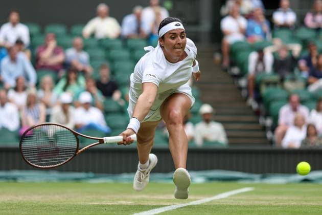 Wimbledon: Day Six 8 July 2023, Wimbledon - Wimbledon Tennis Championships - Day Six - Ons Jabeur (TUN) stretches for the ball - Photo: Charlotte Wilson Offside. Wimbledon UK Copyright: xCharlottexWilsonx xOffsidexOffside