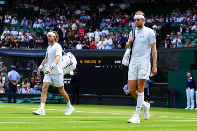 Mandatory Credit: Photo by Javier Garcia Shutterstock (14003010ak) Andrey Rublev and Alexander Bublik walk onto court ahead of their fourth round match Wimbledon Tennis Championships, Day 7, The All England Lawn Tennis and Croquet Club, London, UK - 09 Jul 2023 Wimbledon Tennis Championships, Day 7, The All England Lawn Tennis and Croquet Club, London, UK - 09 Jul 2023  Copyright: xJavierxGarcia Shutterstockx 14003010ak
