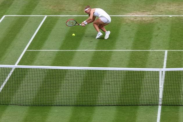 Wimbledon: Day Seven 9 July 2023, Wimbledon - Wimbledon Tennis Championships - Day Seven - Marie Bouzkova (CZE) slips and falls as she returns the ball - Photo: Charlotte Wilson Offside. Wimbledon UK Copyright: xCharlottexWilsonx xOffsidexOffside
