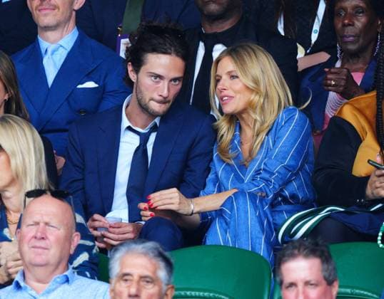 Mandatory Credit: Photo by Javier Garcia Shutterstock (14003010cj) Oli Green and Sienna Miller watching the action on Centre Court Wimbledon Tennis Championships, Day 7, The All England Lawn Tennis and Croquet Club, London, UK - 09 Jul 2023 Wimbledon Tennis Championships, Day 7, The All England Lawn Tennis and Croquet Club, London, UK - 09 Jul 2023  Copyright: xJavierxGarcia Shutterstockx 14003010cj