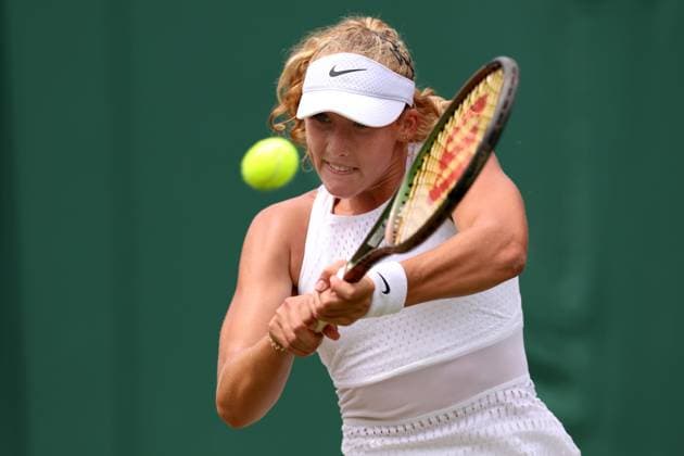 9th July 2023; All England Lawn Tennis and Croquet Club, London, England: Wimbledon Tennis Tournament; Mirra Andreeva plays a backhand shot to Anastasia Potapova  ActionPlus12529253 ShaunxBrooks