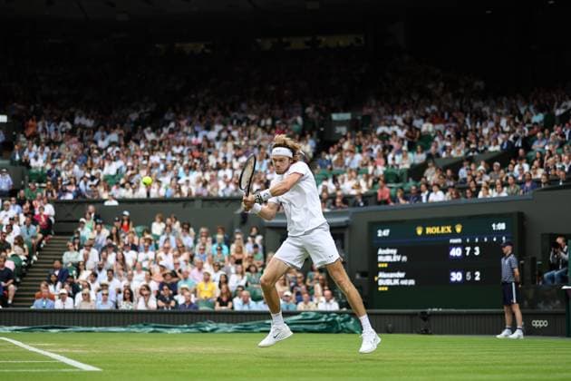 Wimbledon: Day Seven 9 July 2023, Wimbledon - Wimbledon Tennis Championships - Day Seven - Andrey Rublev returns the ball to Alexander Bublik with a two-handed backhand - Photo: Charlotte Wilson Offside. Wimbledon UK Copyright: xCharlottexWilsonx xOffsidexOffside