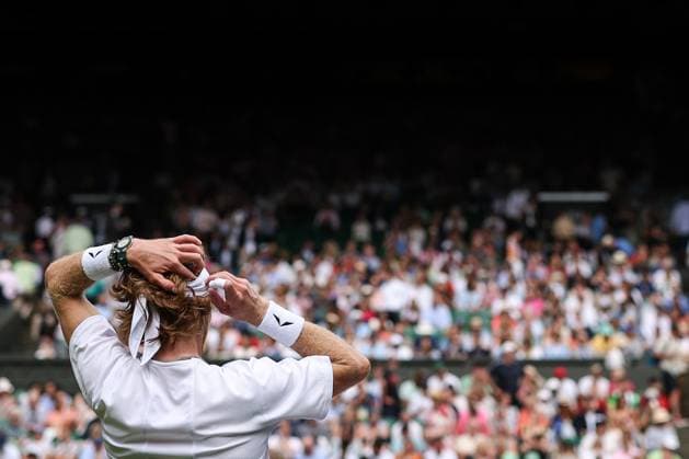 Wimbledon: Day Seven 9 July 2023, Wimbledon - Wimbledon Tennis Championships - Day Seven - Andrey Rublev adjusts his headband - Photo: Charlotte Wilson Offside. Wimbledon UK Copyright: xCharlottexWilsonx xOffsidexOffside