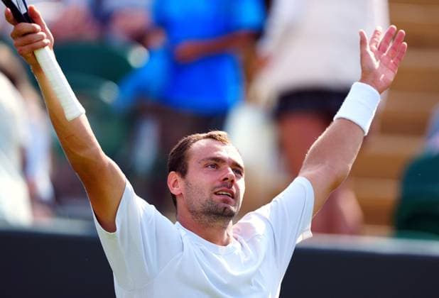 Mandatory Credit: Photo by Javier Garcia Shutterstock (14003010dt) Roman Safiullin celebrates victory in his fourth round match Wimbledon Tennis Championships, Day 7, The All England Lawn Tennis and Croquet Club, London, UK - 09 Jul 2023 Wimbledon Tennis Championships, Day 7, The All England Lawn Tennis and Croquet Club, London, UK - 09 Jul 2023  Copyright: xJavierxGarcia Shutterstockx 14003010dt