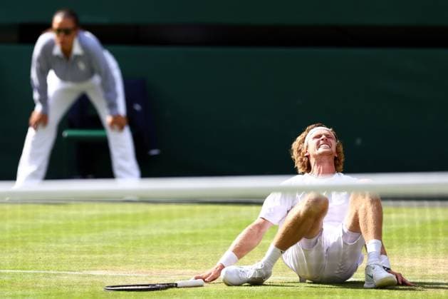 Mandatory Credit: Photo by Simon Dael Shutterstock (14003009de) Andrey Rublev slips during his fourth round match Wimbledon Tennis Championships, Day 7, The All England Lawn Tennis and Croquet Club, London, UK - 09 Jul 2023 Wimbledon Tennis Championships, Day 7, The All England Lawn Tennis and Croquet Club, London, UK - 09 Jul 2023  Copyright: xSimonxDael Shutterstockx 14003009de