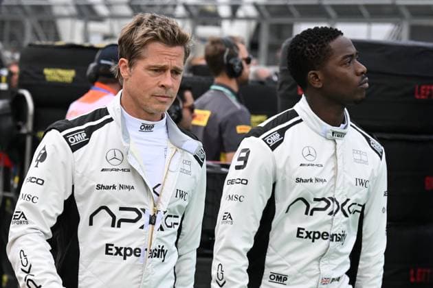 9th July 2023: Silverstone Circuit, Northamptonshire, England: Formula 1 2023 Aramco British F1 Grand Prix: Race Day; Brad Pitt and Damson Idris during filming on the starting grid at the start of the Grand Prix  ActionPlus12529303 SimonxWest