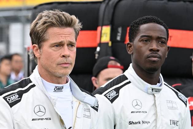 9th July 2023: Silverstone Circuit, Northamptonshire, England: Formula 1 2023 Aramco British F1 Grand Prix: Race Day; Brad Pitt and Damson Idris during filming on the starting grid at the start of the Grand Prix  ActionPlus12529305 SimonxWest