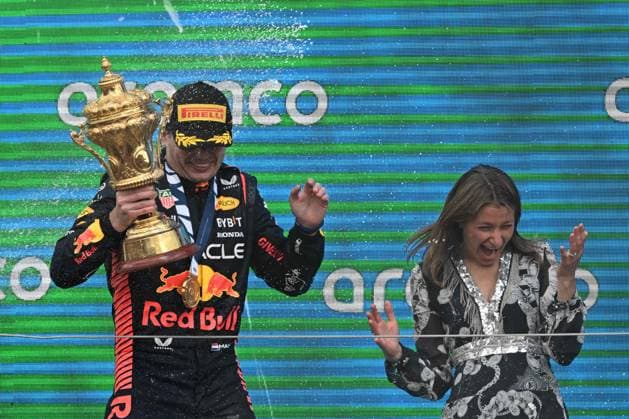 9th July 2023: Silverstone Circuit, Northamptonshire, England: Formula 1 2023 Aramco British F1 Grand Prix: Race Day; Max Verstappen of the Red Bull Racing team is sprayed with Champagne on the podium  ActionPlus12529314 SimonxWest