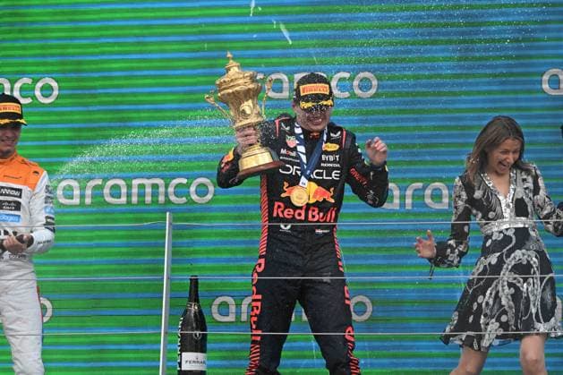 9th July 2023: Silverstone Circuit, Northamptonshire, England: Formula 1 2023 Aramco British F1 Grand Prix: Race Day; Lando Norris of the McLaren-Mercedes team sprays Max Verstappen of the Red Bull Racing team with Champagne  ActionPlus12529315 SimonxWest