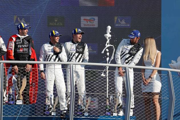 Sport Bilder des Tages 93 DI RESTA Paul (fra), JENSEN Mikkel (dnk), VERGNE Jean-Eric (fra), Peugeot TotalEnergies, Peugeot 9x8, podium, portrait, during the 6 Hours of Monza 2023, 3rd round of the 2023 FIA World Endurance Championship, from July 7 to 9, 2023 on the Autodrome Nazionale di Monza, in Monza, Italy - AUTO - FIA WEC - 6 HOURS OF MONZA 2023 DPPI Panoramic  02223011__LF_2210 