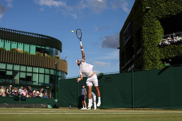 Wimbledon: Day Seven 9 July 2023, Wimbledon - Wimbledon Tennis Championships - Day Seven - Mate Pavic (CRO) serves - Photo: Charlotte Wilson Offside. Wimbledon UK Copyright: xCharlottexWilsonx xOffsidexOffside