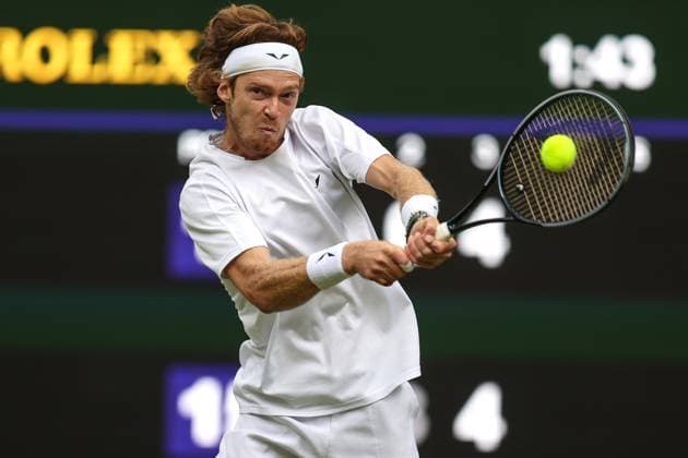 Wimbledon: Day Seven 9 July 2023, Wimbledon - Wimbledon Tennis Championships - Day Seven - Andrey Rublev returns the ball - Photo: Charlotte Wilson Offside. Wimbledon UK Copyright: xCharlottexWilsonx xOffsidexOffside