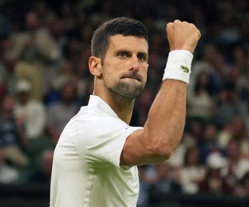 Tennis - 2023 Wimbledon Championships - Week One - Day Seven - All England lawn Tennis & Racquet Club, Wimbledon - Sunday 9th Mens singles - Hubert Hurkacz (POL) v Novak Djokovic (SRB) Novak Djokovic shakes his fist at the crowd after winning the first set 