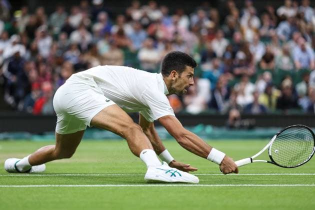 Wimbledon: Day Seven 9 July 2023, Wimbledon - Wimbledon Tennis Championships - Day Seven - Novak Djokovic (SRB) stretches to return the ball to Hubert Hurkacz (POL) - Photo: Charlotte Wilson Offside. Wimbledon UK Copyright: xCharlottexWilsonx xOffsidexOffside