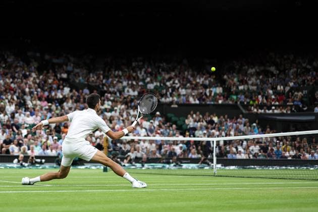 Wimbledon: Day Seven 9 July 2023, Wimbledon - Wimbledon Tennis Championships - Day Seven - Novak Djokovic (SRB) stretches to return the ball to Hubert Hurkacz (POL) - Photo: Charlotte Wilson Offside. Wimbledon UK Copyright: xCharlottexWilsonx xOffsidexOffside