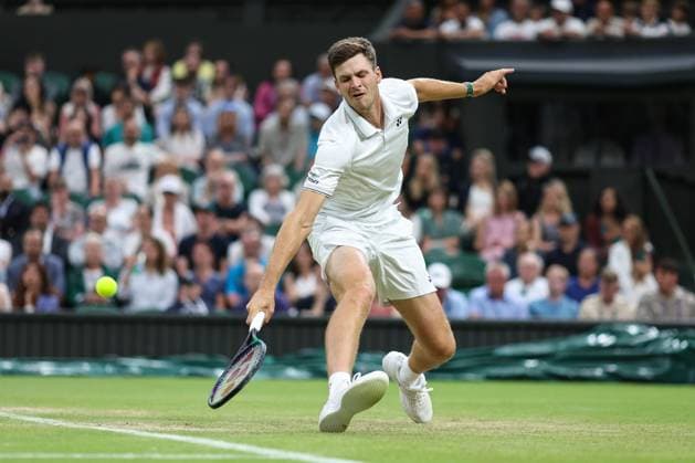 Wimbledon: Day Seven 9 July 2023, Wimbledon - Wimbledon Tennis Championships - Day Seven - Hubert Hurkacz (POL) returns the ball to Novak Djokovic (SRB) - Photo: Charlotte Wilson Offside. Wimbledon UK Copyright: xCharlottexWilsonx xOffsidexOffside