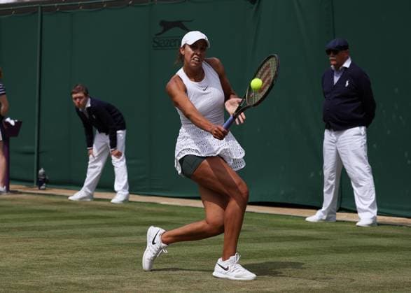 10th July 2023; All England Lawn Tennis and Croquet Club, London, England: Wimbledon Tennis Tournament; Madison Keys (USA) with a backhand shot to Mirra Andreeva (RUS) in womens singles match  ActionPlus12529742 JohnxPatrickxFletcher