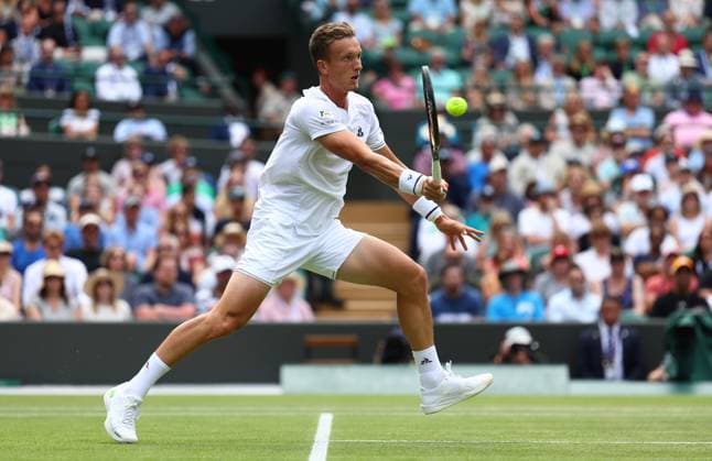 Mandatory Credit: Photo by Simon Dael Shutterstock (14003752ao) Jiri Lehecka in action against Daniil Medvedev Wimbledon Tennis Championships, Day 8, The All England Lawn Tennis and Croquet Club, London, UK - 10 Jul 2023 Wimbledon Tennis Championships, Day 8, The All England Lawn Tennis and Croquet Club, London, UK - 10 Jul 2023  Copyright: xSimonxDael Shutterstockx 14003752ao