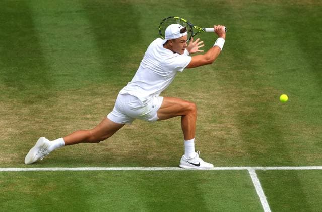 Mandatory Credit: Photo by Ella Ling Shutterstock (14003751du) Holger Rune in action against Grigor Dimitrov Wimbledon Tennis Championships, Day 8, The All England Lawn Tennis and Croquet Club, London, UK - 10 Jul 2023 Wimbledon Tennis Championships, Day 8, The All England Lawn Tennis and Croquet Club, London, UK - 10 Jul 2023  Copyright: xEllaxLing Shutterstockx 14003751du