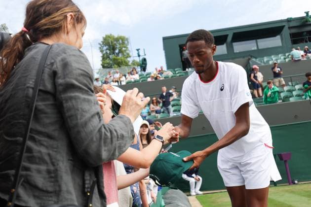 Wimbledon: Day Eight 10 July 2023, Wimbledon - Wimbledon Tennis Championships - Day Eight - Christopher Eubanks (USA) celebrates with fans after his Gentlemen s Singles Round of 16 match victory against Stefanos Tsitsipas (GRC) - Photo: Charlotte Wilson Offside. Wimbledon UK Copyright: xCharlottexWilsonx xOffsidexOffside