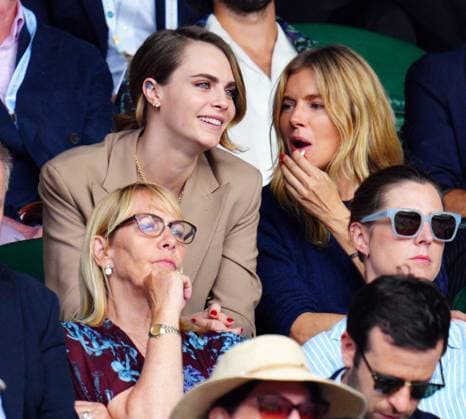 Mandatory Credit: Photo by Javier Garcia Shutterstock (14003748is) Cara Delevingne and Sienna Miller in the crowd on Centre Court Wimbledon Tennis Championships, Day 8, The All England Lawn Tennis and Croquet Club, London, UK - 10 Jul 2023 Wimbledon Tennis Championships, Day 8, The All England Lawn Tennis and Croquet Club, London, UK - 10 Jul 2023  Copyright: xJavierxGarcia Shutterstockx 14003748is
