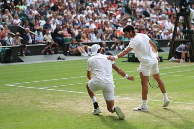 Wimbledon: Day Eight 10 July 2023, Wimbledon - Wimbledon Tennis Championships - Day Eight - Matteo Berrettini (ITA) falls to the ground and is checked on by Carlos Alcaraz (ESP) during their Gentlemen s Singles Round of 16 match - Photo: Charlotte Wilson Offside. Wimbledon UK Copyright: xCharlottexWilsonx xOffsidexOffside