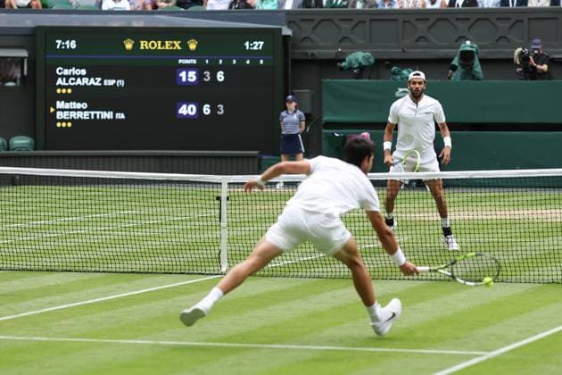 Wimbledon: Day Eight 10 July 2023, Wimbledon - Wimbledon Tennis Championships - Day Eight - Carlos Alcaraz (ESP) in action as Matteo Berrettini (ITA) waits for the ball during their Gentlemen s Singles Round of 16 match - Photo: Charlotte Wilson Offside. Wimbledon UK Copyright: xCharlottexWilsonx xOffsidexOffside