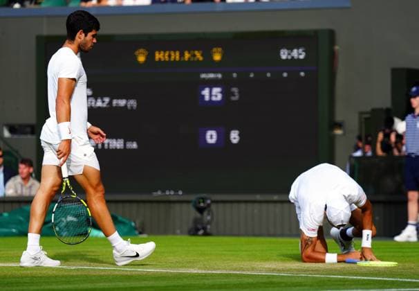 Mandatory Credit: Photo by Javier Garcia Shutterstock (14003748jr) Matteo Berrettini falls during his fourth round match, Carlos Alcaraz checks to see that he is ok Wimbledon Tennis Championships, Day 8, The All England Lawn Tennis and Croquet Club, London, UK - 10 Jul 2023 Wimbledon Tennis Championships, Day 8, The All England Lawn Tennis and Croquet Club, London, UK - 10 Jul 2023  Copyright: xJavierxGarcia Shutterstockx 14003748jr