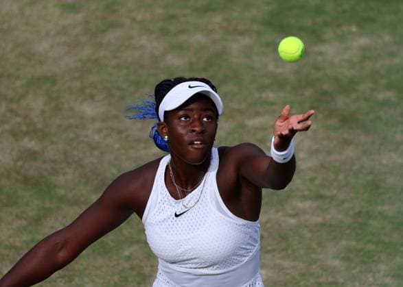 10th July 2023; All England Lawn Tennis and Croquet Club, London, England: Wimbledon Tennis Tournament; Clervie Ngounoue (USA) serves to Isabelle Lacy (GBR)  ActionPlus12530036 JohnxPatrickxFletcher