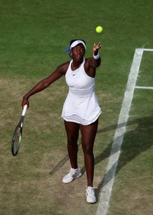 10th July 2023; All England Lawn Tennis and Croquet Club, London, England: Wimbledon Tennis Tournament; Clervie Ngounoue (USA) serves to Isabelle Lacy (GBR)  ActionPlus12530039 JohnxPatrickxFletcher