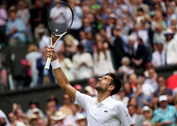 (230711) -- LONDON, July 11, 2023 -- Novak Djokovic of Serbia celebrates after winning the men s singles fourth round match between Novak Djokovic of Serbia and Hubert Hurkacz of Poland at Wimbledon Tennis Championships in London, Britain, July 10, 2023. ) (SP)BRITAIN-LONDON-TENNIS-WIMBLEDON-DAY 8 LixYing 