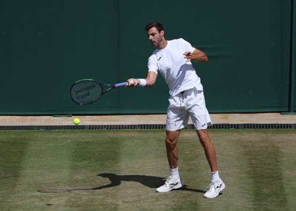 11th July 2023; All England Lawn Tennis and Croquet Club, London, England: Wimbledon Tennis Tournament; Marcel Granollers (ESP) with a forehand shot to Robert Galloway (USA) mens doubles round of 16  ActionPlus12530052 JohnxPatrickxFletcher