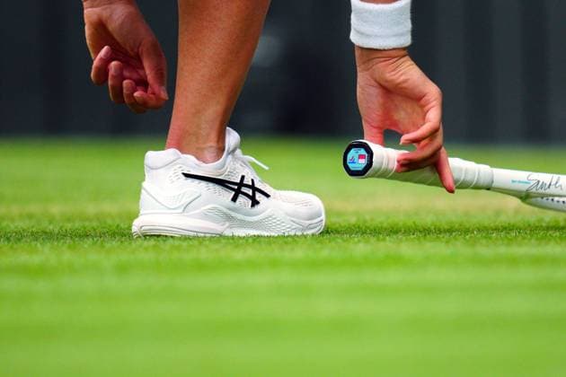 Mandatory Credit: Photo by Javier Garcia Shutterstock (14003753bt) The Ascis tennis shoes of Iga Swiatek Wimbledon Tennis Championships, Day 9, The All England Lawn Tennis and Croquet Club, London, UK - 11 Jul 2023 Wimbledon Tennis Championships, Day 9, The All England Lawn Tennis and Croquet Club, London, UK - 11 Jul 2023  Copyright: xJavierxGarcia Shutterstockx 14003753bt