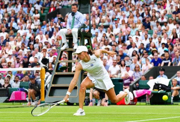 Mandatory Credit: Photo by Javier Garcia Shutterstock (14003753dz) Iga Swiatek during her quarter final match Wimbledon Tennis Championships, Day 9, The All England Lawn Tennis and Croquet Club, London, UK - 11 Jul 2023 Wimbledon Tennis Championships, Day 9, The All England Lawn Tennis and Croquet Club, London, UK - 11 Jul 2023  Copyright: xJavierxGarcia Shutterstockx 14003753dz