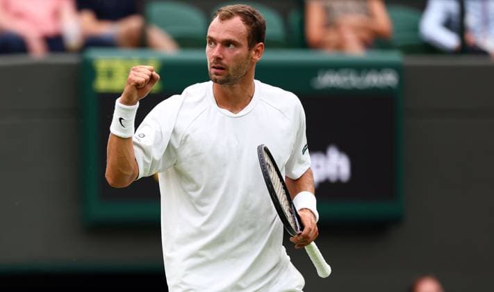 Mandatory Credit: Photo by Simon Dael Shutterstock (14003756cs) Roman Safiullin celebrates against Jannik Sinner Wimbledon Tennis Championships, Day 9, The All England Lawn Tennis and Croquet Club, London, UK - 11 Jul 2023 Wimbledon Tennis Championships, Day 9, The All England Lawn Tennis and Croquet Club, London, UK - 11 Jul 2023  Copyright: xSimonxDael Shutterstockx 14003756cs