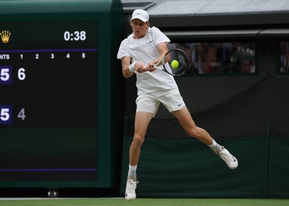 11th July 2023; All England Lawn Tennis and Croquet Club, London, England: Wimbledon Tennis Tournament; Jannik Sinner (ITA) with a backhand shot to Roman Safiullin (RUS)  ActionPlus12530256 JohnxPatrickxFletcher
