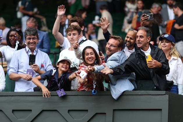 Wimbledon: Day Nine 11 July 2023, Wimbledon - Wimbledon Tennis Championships - Day Nine - Fans reach out for the sweatband of Novak Djokovic after he throws it up to them - Photo: Charlotte Wilson Offside. Wimbledon UK Copyright: xCharlottexWilsonx xOffsidexOffside