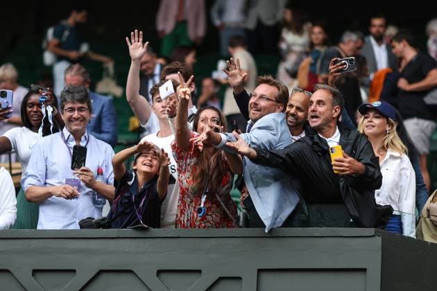 Wimbledon: Day Nine 11 July 2023, Wimbledon - Wimbledon Tennis Championships - Day Nine - Fans reach out for the sweatband of Novak Djokovic after he throws it up to them - Photo: Charlotte Wilson Offside. Wimbledon UK Copyright: xCharlottexWilsonx xOffsidexOffside